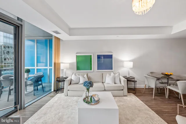 a living room with furniture and a table