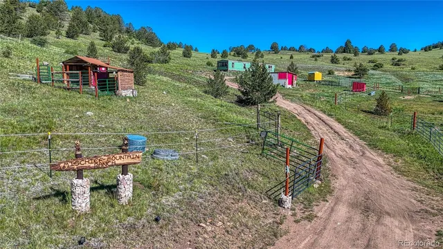 a view of a large building with a yard