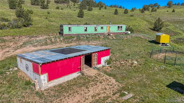 a view of a room with wooden walls
