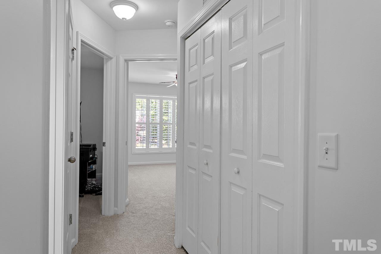 7136 Racine Way Raleigh, NC 27615 - Photo 24 of 32 a view of an empty room with window and closet area