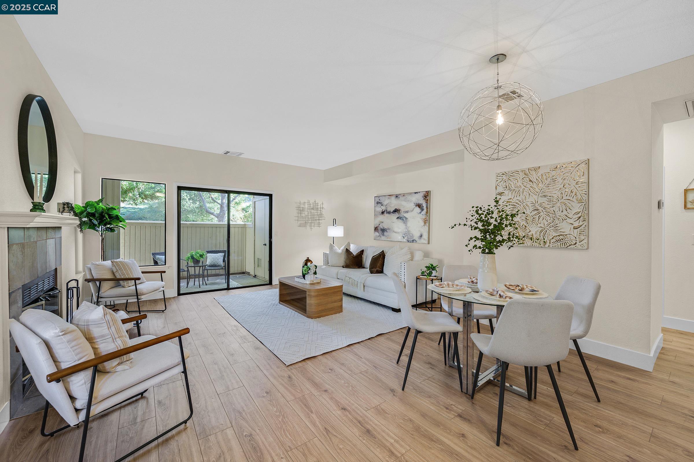 246 Copper Ridge Road San Ramon, CA 94582 - Photo 1 of 41 a living room with furniture a dining table and a potted plant