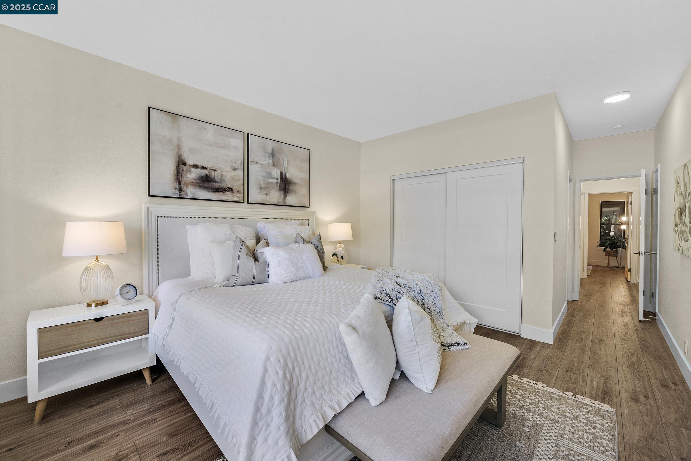 246 Copper Ridge Road San Ramon, CA 94582 - Photo 17 of 41 a bedroom with a bed and a lamp