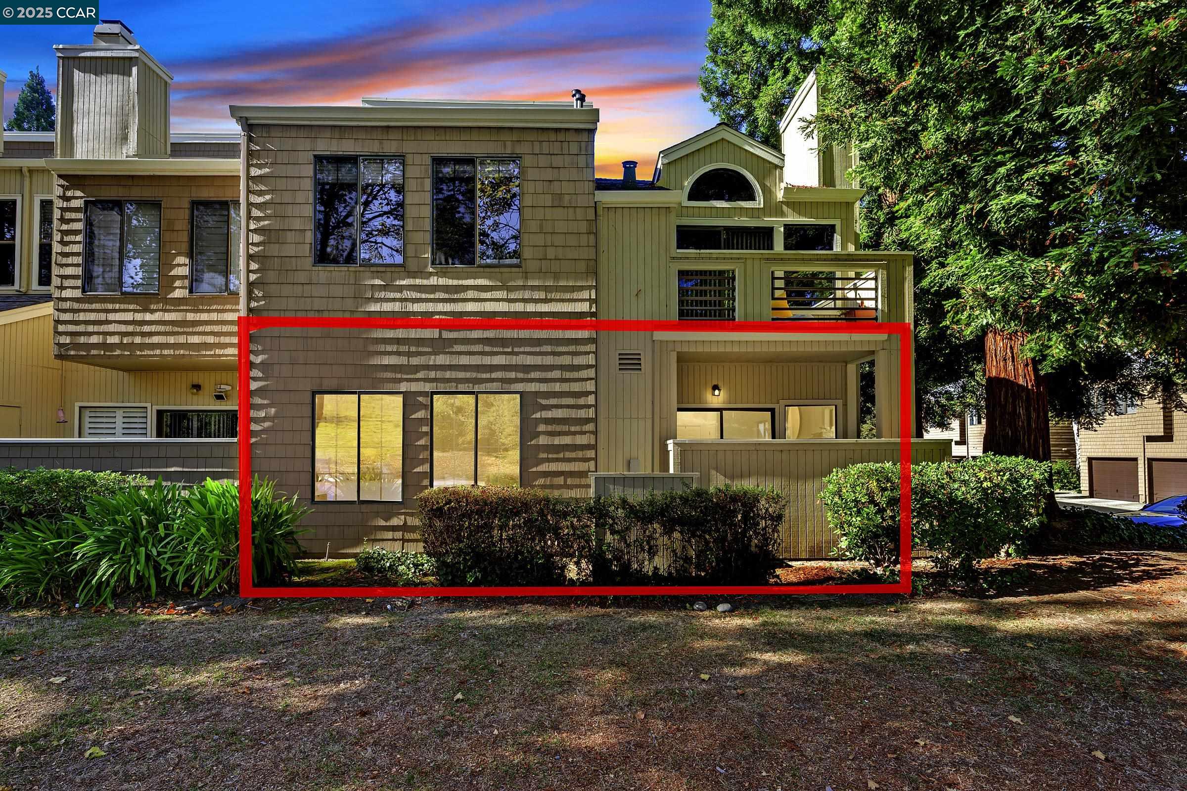 246 Copper Ridge Road San Ramon, CA 94582 - Photo 30 of 41 a front view of a house with lots of trees and plants