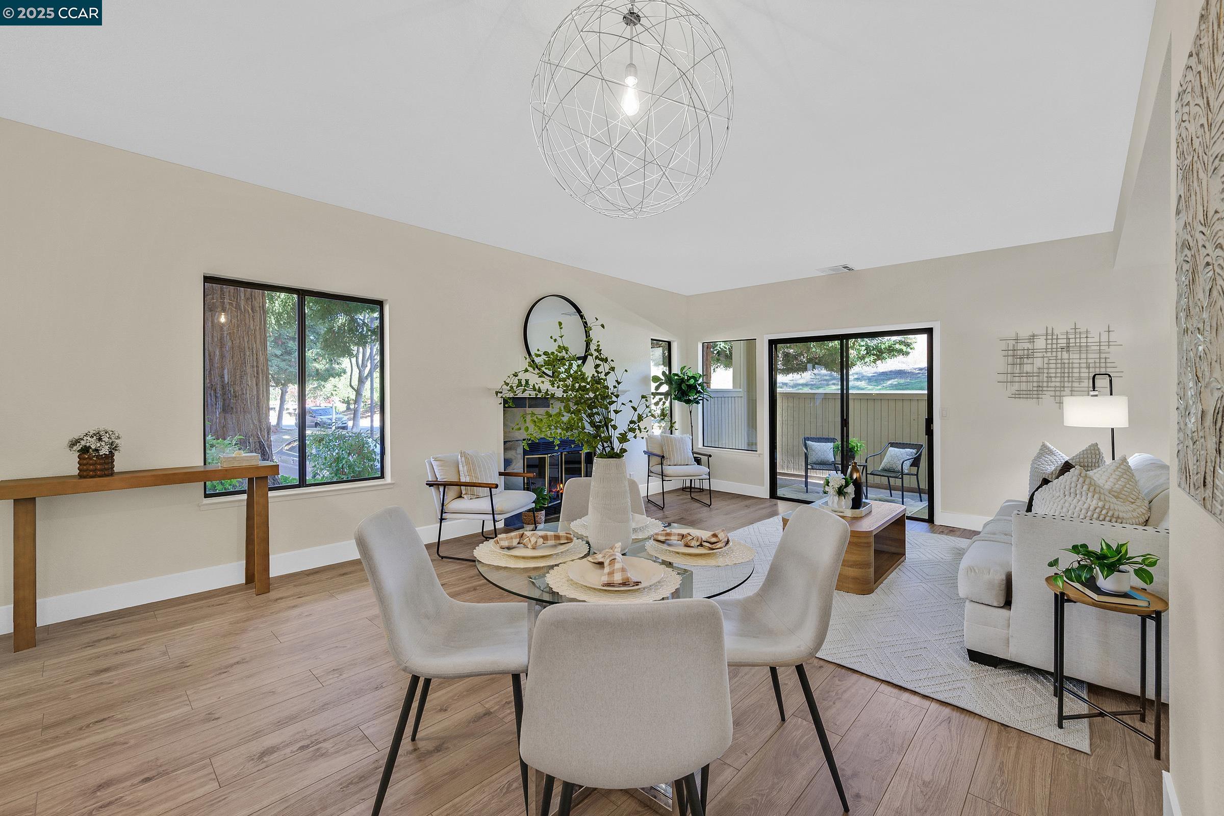 246 Copper Ridge Road San Ramon, CA 94582 - Photo 3 of 41 a view of a dining room with furniture window and wooden floor