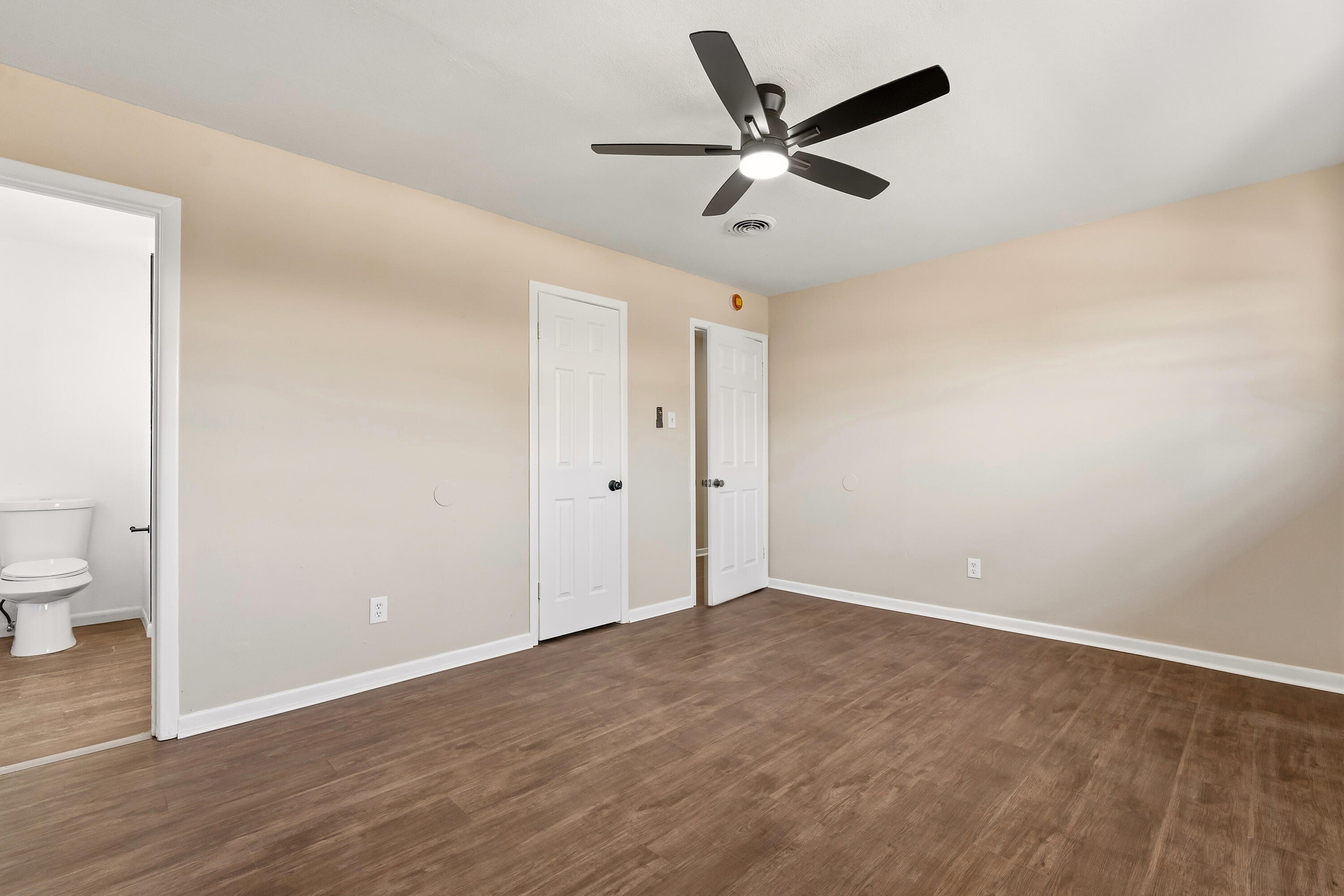 5015 16th Street Lubbock, TX 79416 - Photo 21 of 27 wooden floor in an empty room