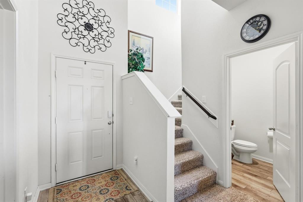189 Point Rider Road Newark, TX 76071 - Photo 2 of 14 a view of an entryway with wooden floor