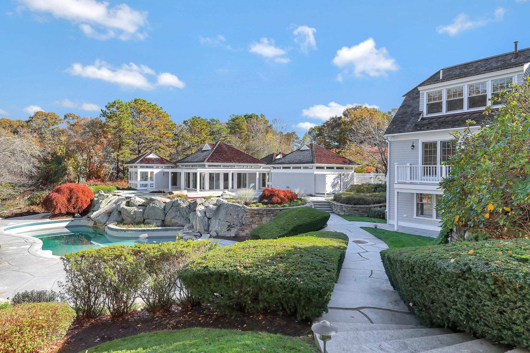 125 Greensward Road Mashpee, MA 02649 - Photo 29 of 60 a front view of a house with garden