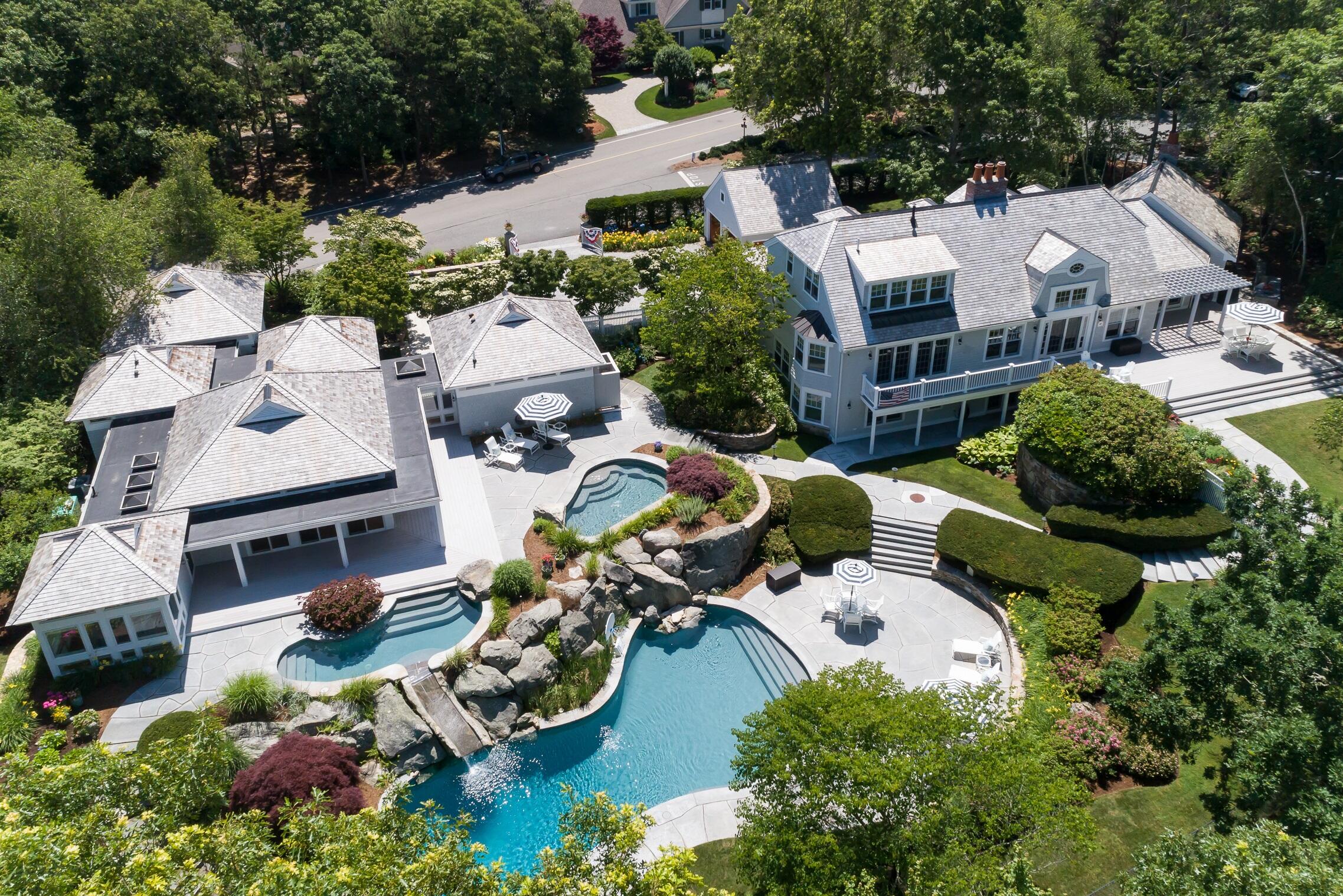 125 Greensward Road Mashpee, MA 02649 - Photo 3 of 60 an aerial view of a house with yard swimming pool and outdoor seating
