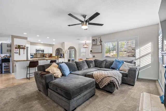 a bed room with a bed and a window