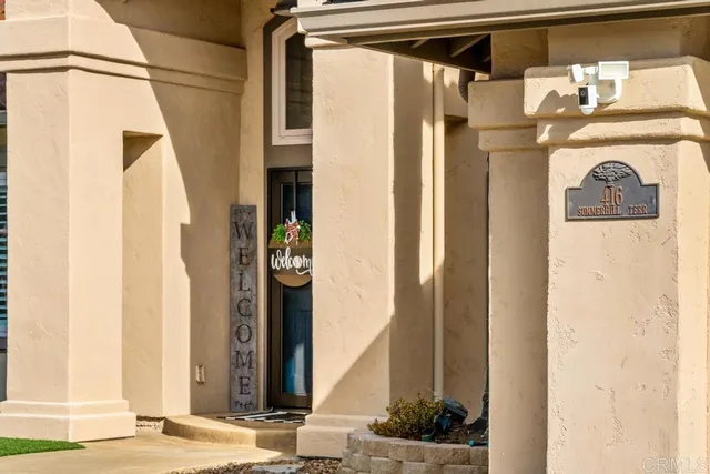 a view of a city with mountains in the background