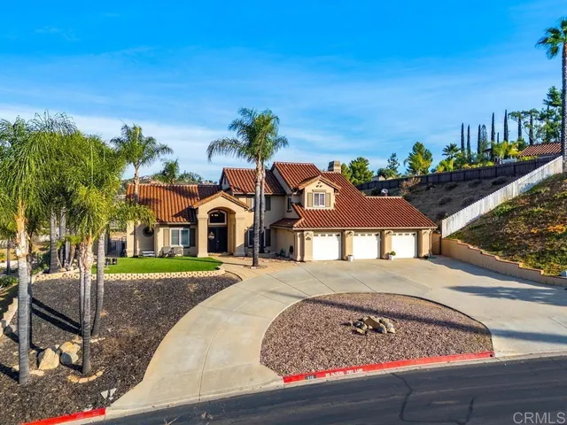 an aerial view of residential building and ocean view