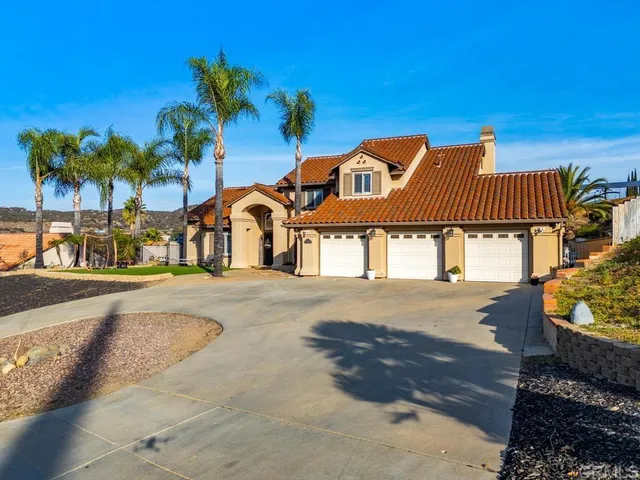 a view of a city with mountains in the background