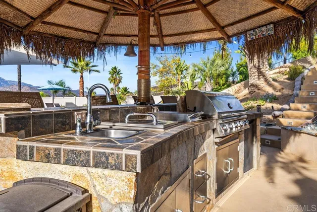 a view of a swimming pool with a yard