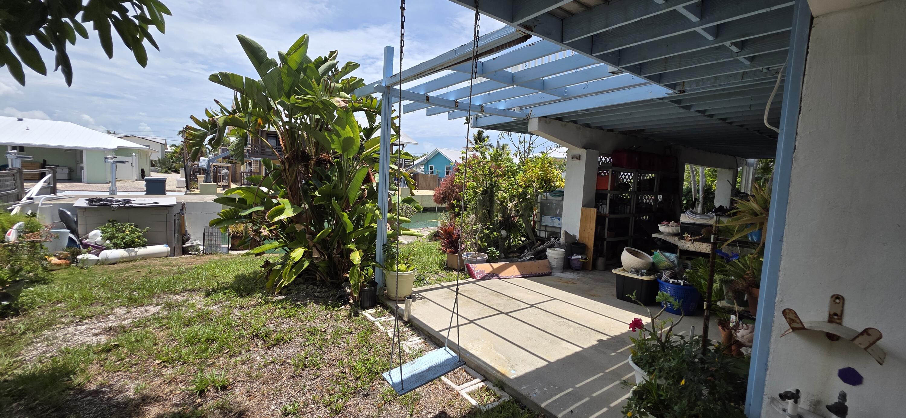 8 Emerald Drive Key West, FL 33040 - Photo 14 of 43 a view of an outdoor sitting area