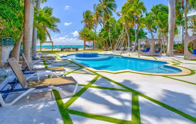 a bedroom with a bed and a lamp