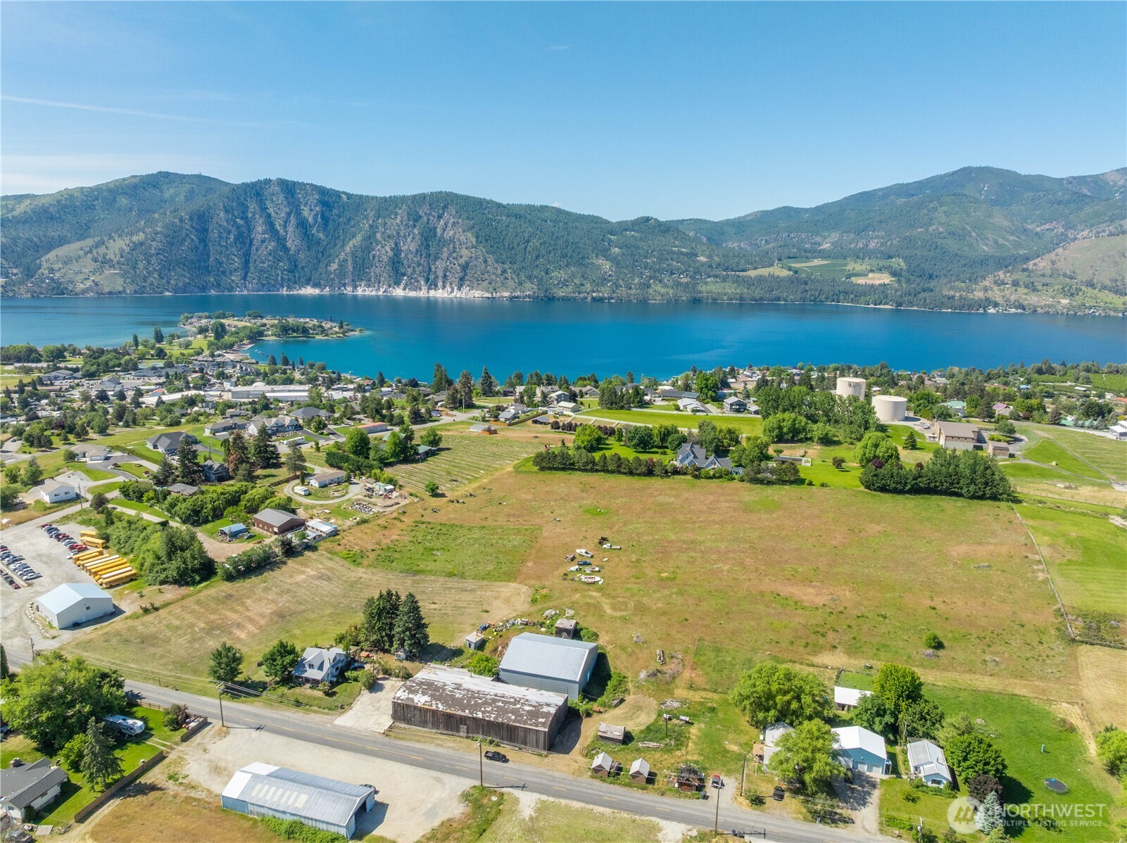 1281 Totem Pole Road Manson, WA 98831 - Photo 32 of 39 a view of a lake with a mountain