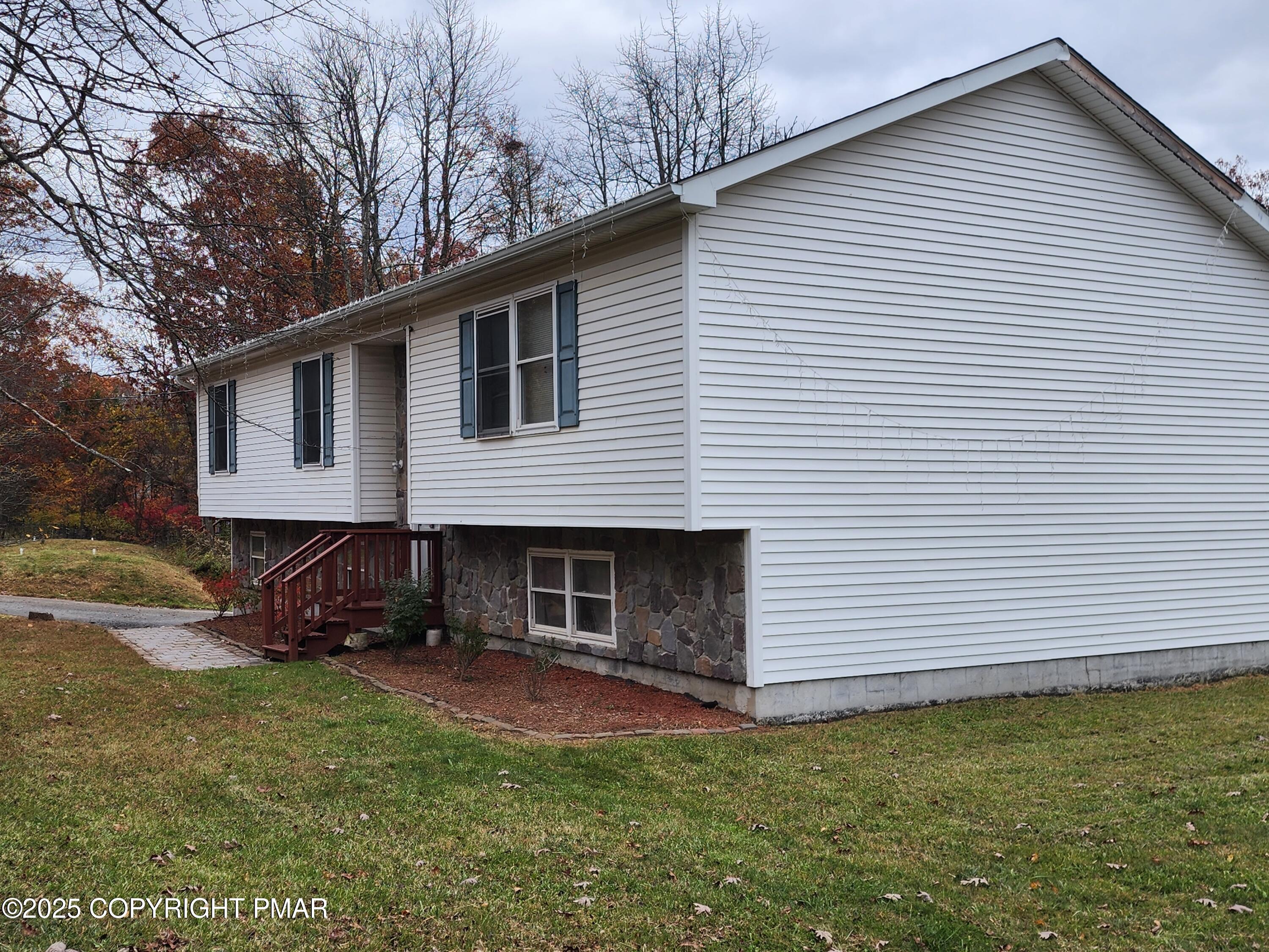 195 Williams Lane Scotrun, PA 18355 - Photo 2 of 17 a view of a house with a yard
