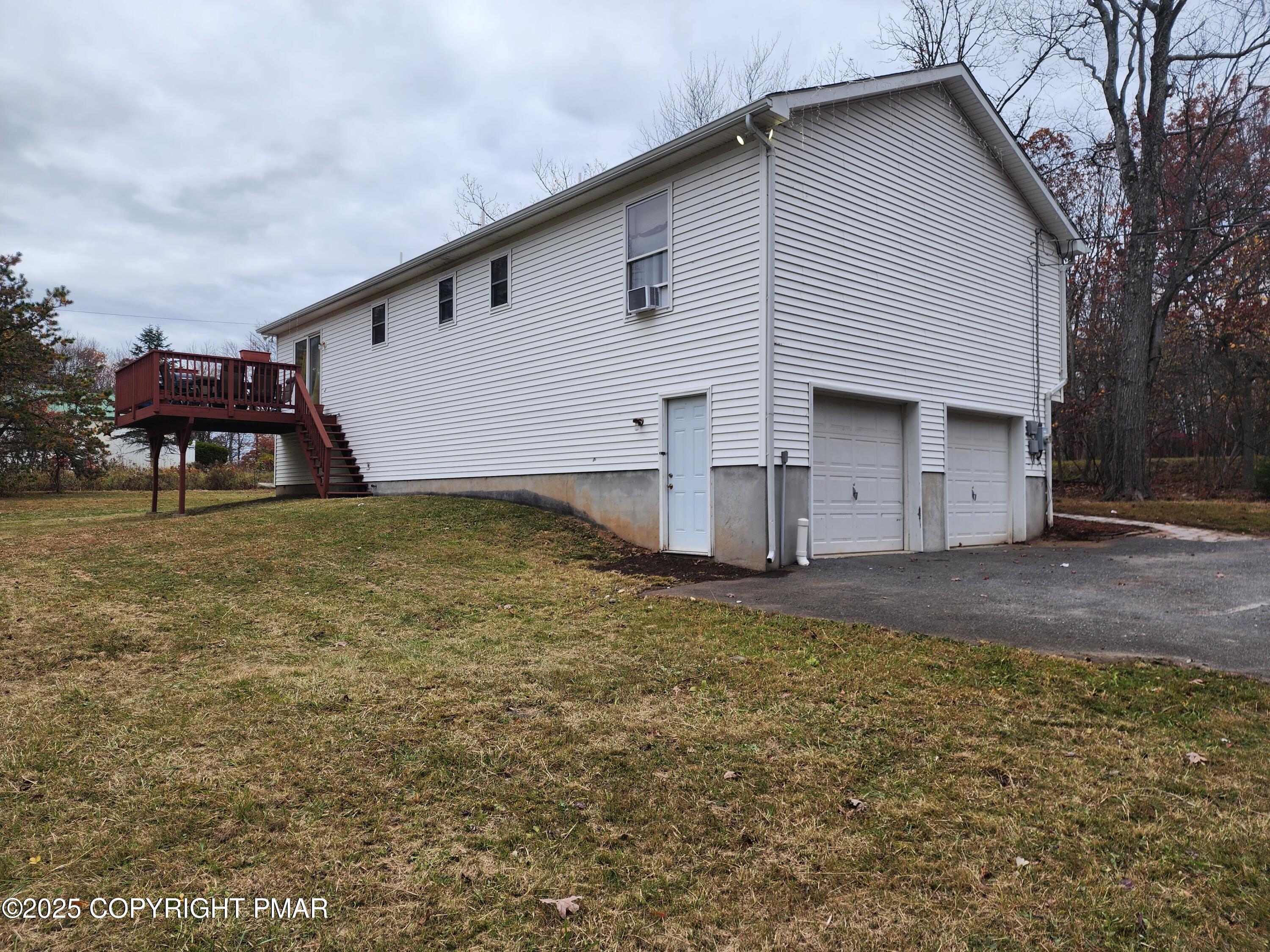 195 Williams Lane Scotrun, PA 18355 - Photo 4 of 17 a house view with a backyard space