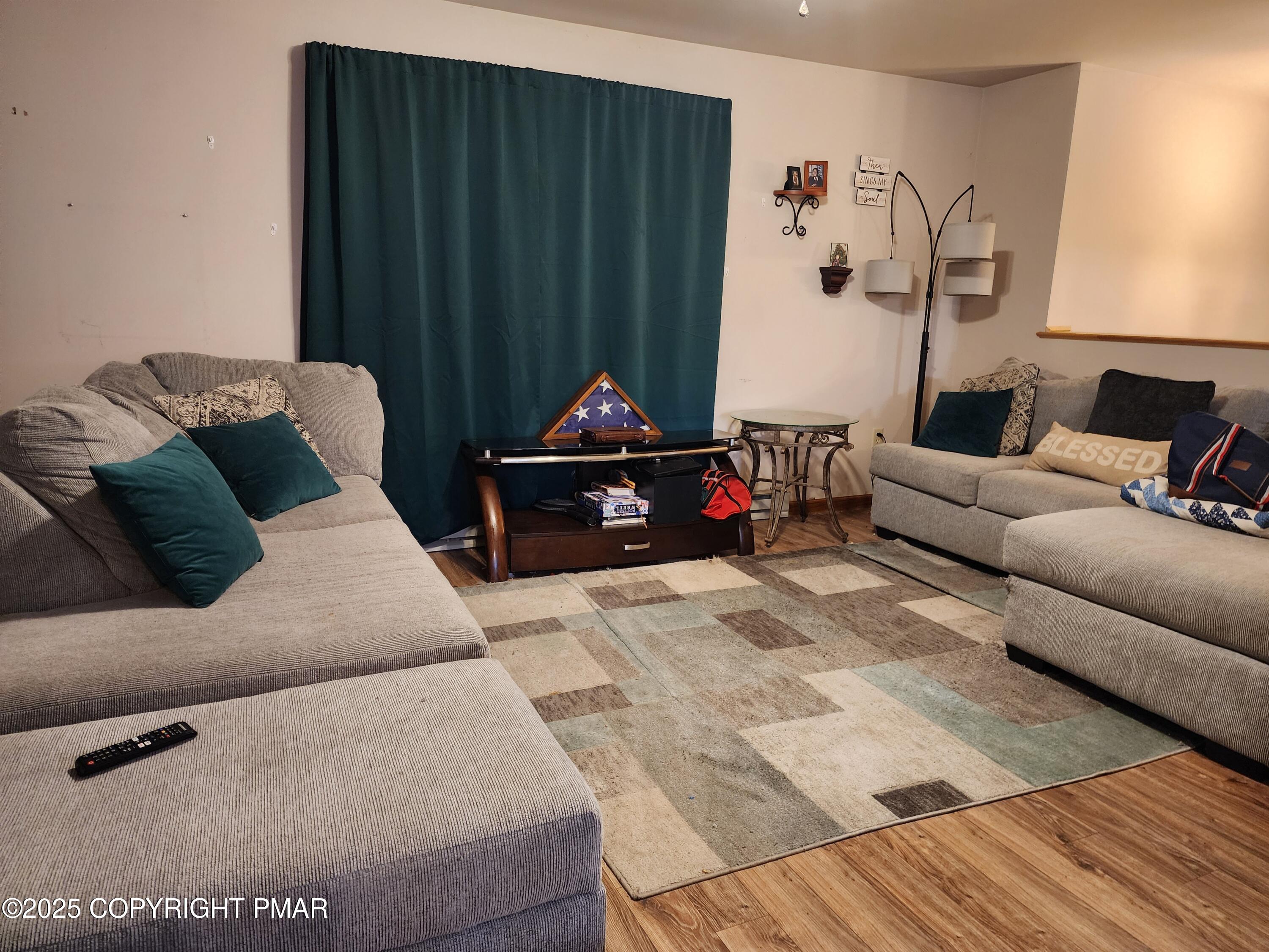195 Williams Lane Scotrun, PA 18355 - Photo 6 of 17 a living room with furniture and a couch