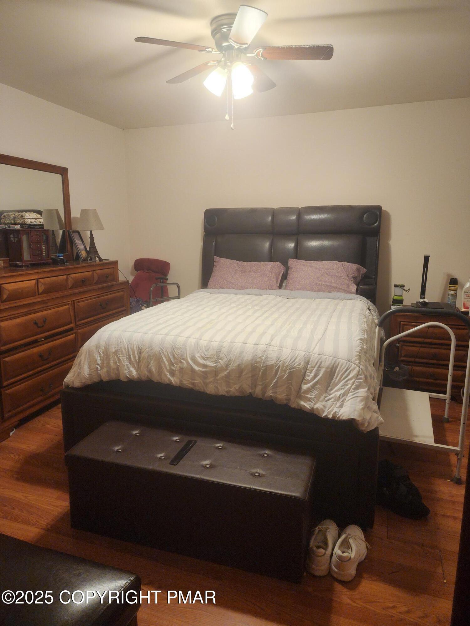 195 Williams Lane Scotrun, PA 18355 - Photo 10 of 17 a bedroom with a bed and a mirror