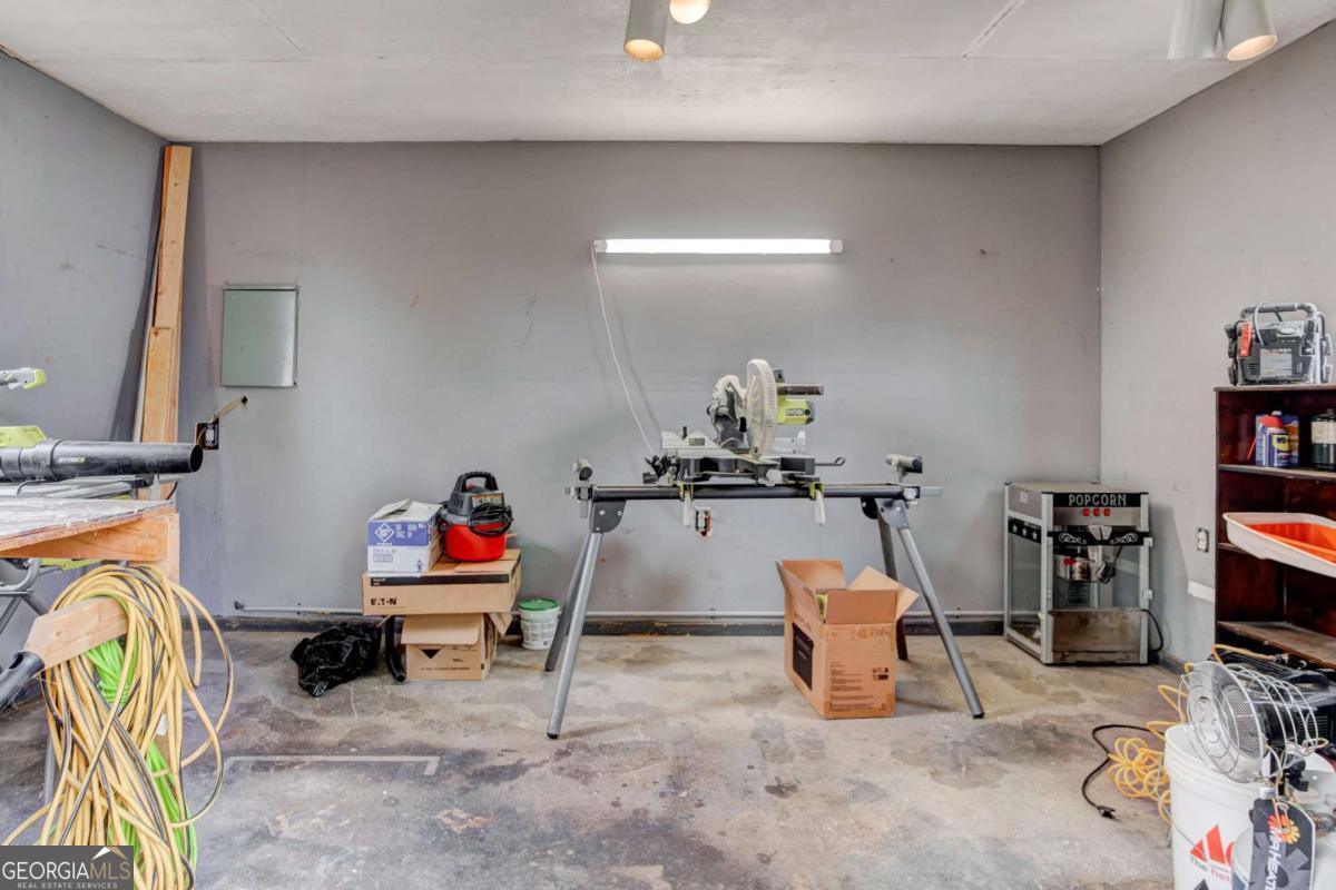 665 Caney Branch Road Lavonia, GA 30553 - Photo 24 of 26 a living room with a couch and toys