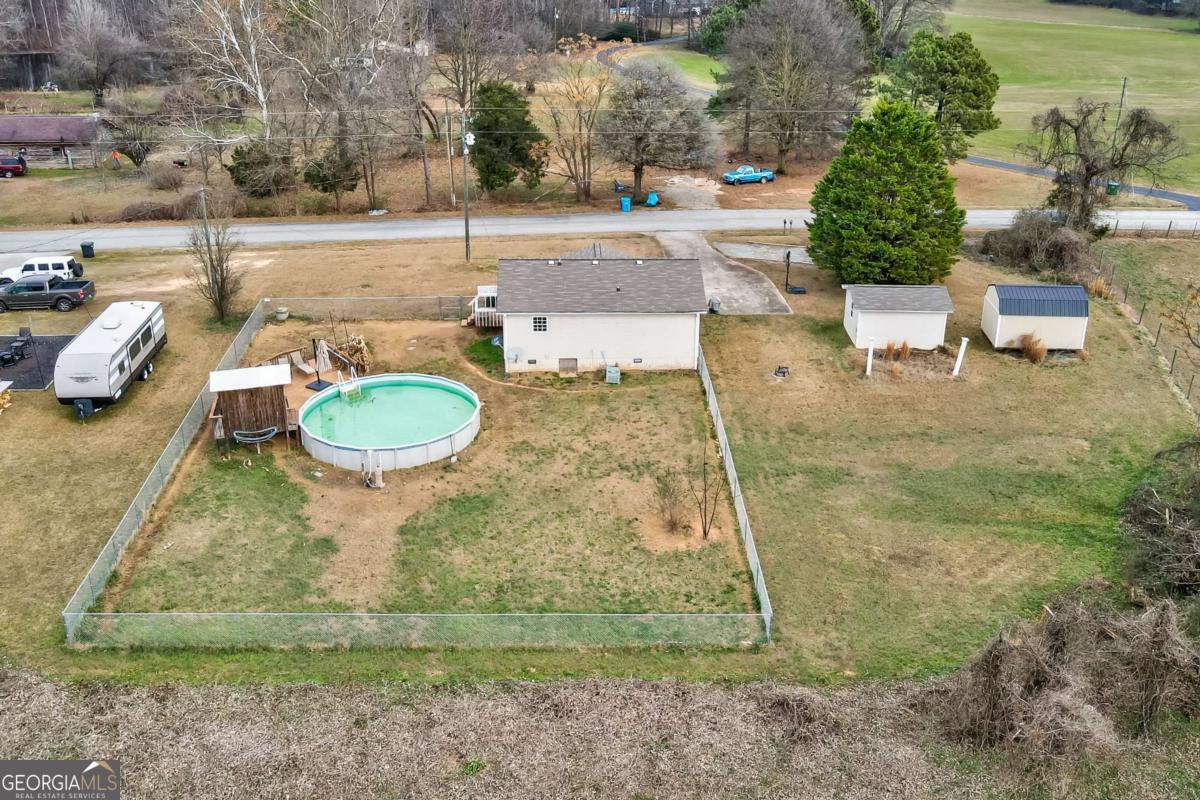 665 Caney Branch Road Lavonia, GA 30553 - Photo 4 of 26 a view of a backyard of the house
