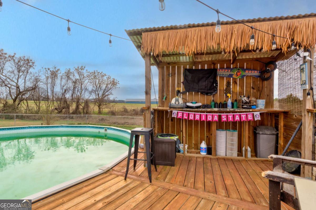 665 Caney Branch Road Lavonia, GA 30553 - Photo 10 of 26 a view of swimming pool with outdoor seating