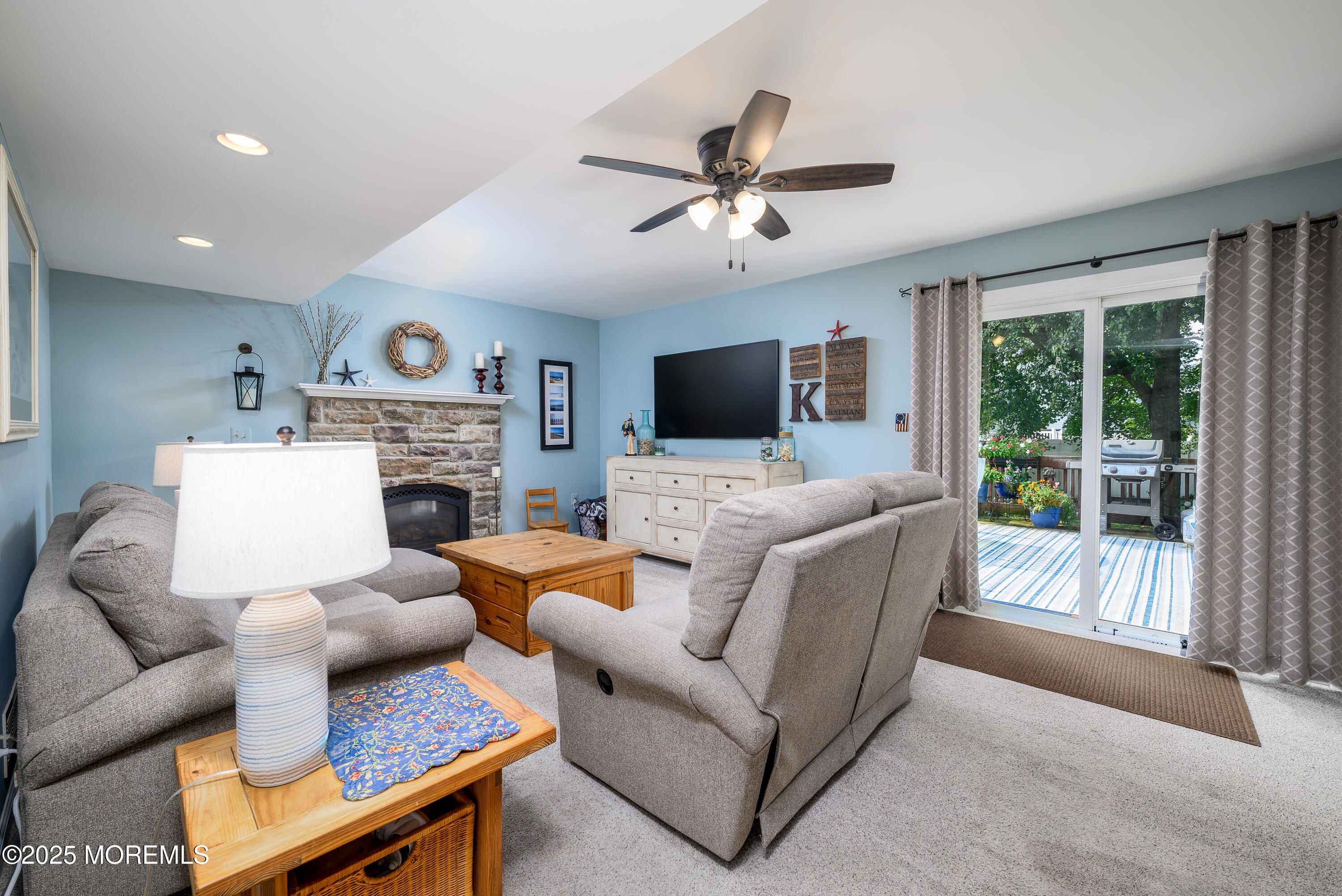 18 Fella Street Howell, NJ 07731 - Photo 20 of 35 a living room with furniture and a flat screen tv