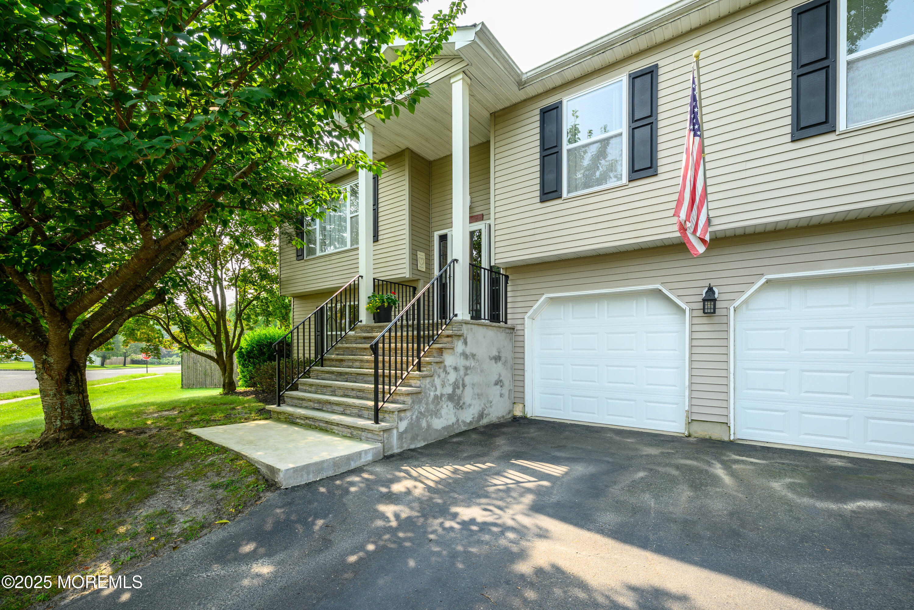18 Fella Street Howell, NJ 07731 - Photo 2 of 35 a front view of a house with a yard