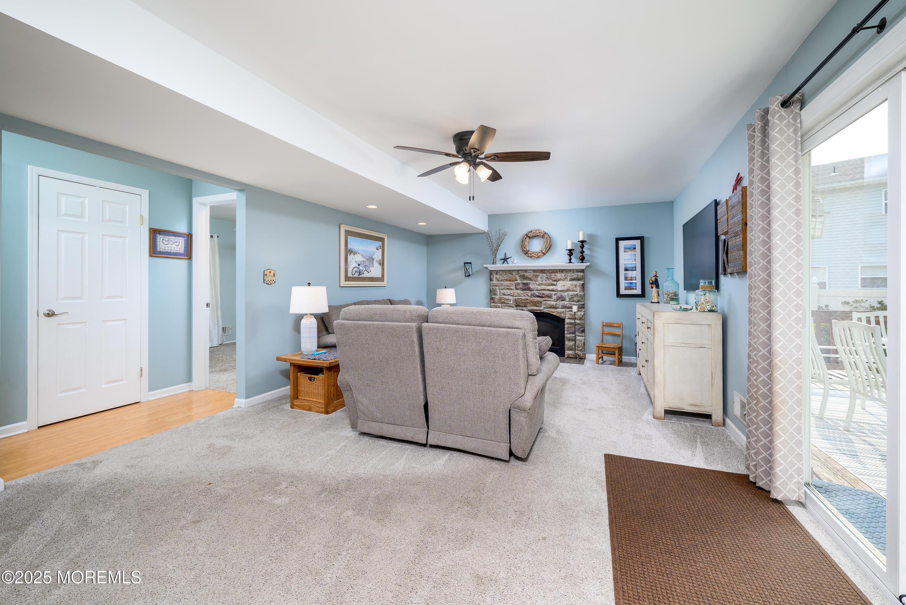18 Fella Street Howell, NJ 07731 - Photo 22 of 35 a view of a livingroom with furniture and a flat screen tv