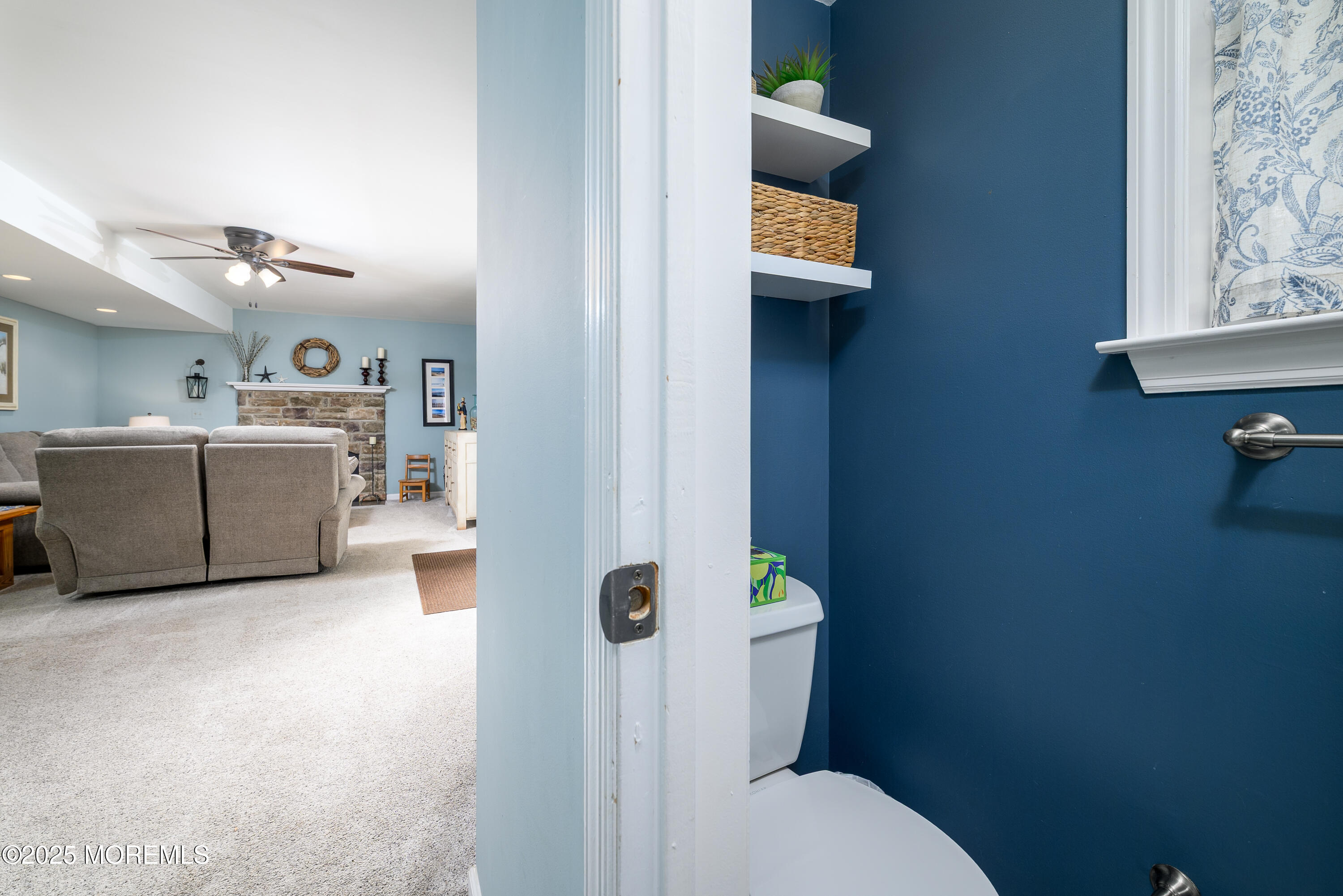 18 Fella Street Howell, NJ 07731 - Photo 23 of 35 a bathroom with a toilet a sink and mirror