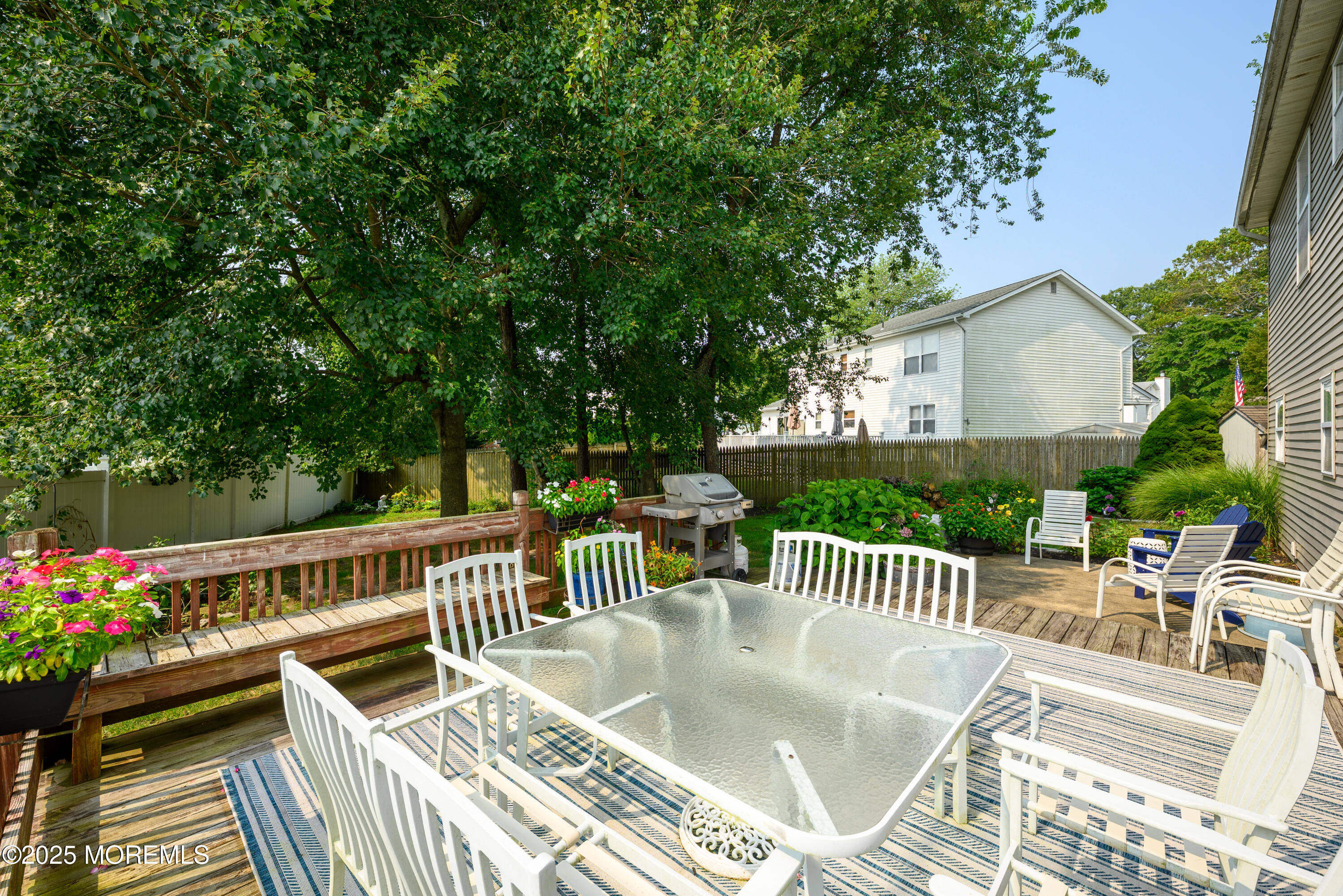 18 Fella Street Howell, NJ 07731 - Photo 27 of 35 a view of a chair and table on the deck