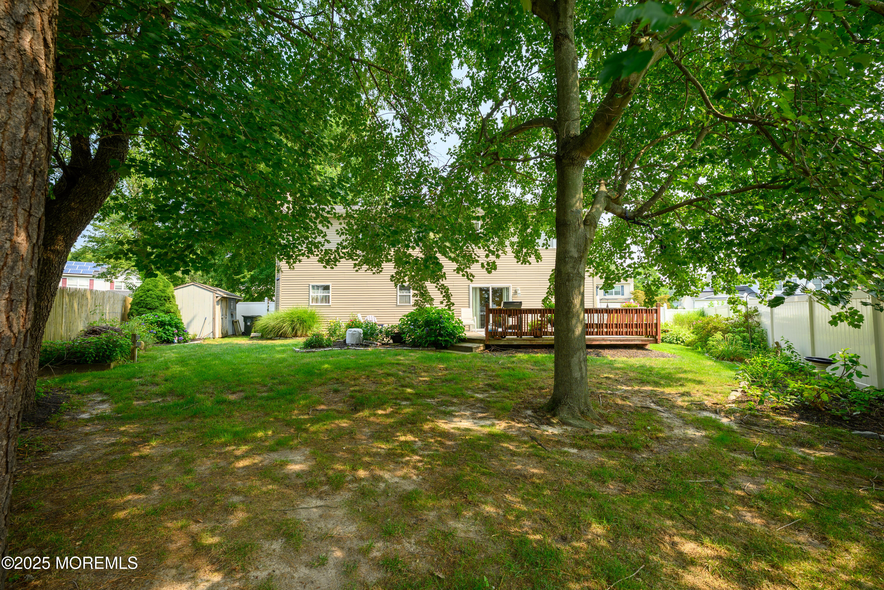18 Fella Street Howell, NJ 07731 - Photo 30 of 35 a view of a street with large trees