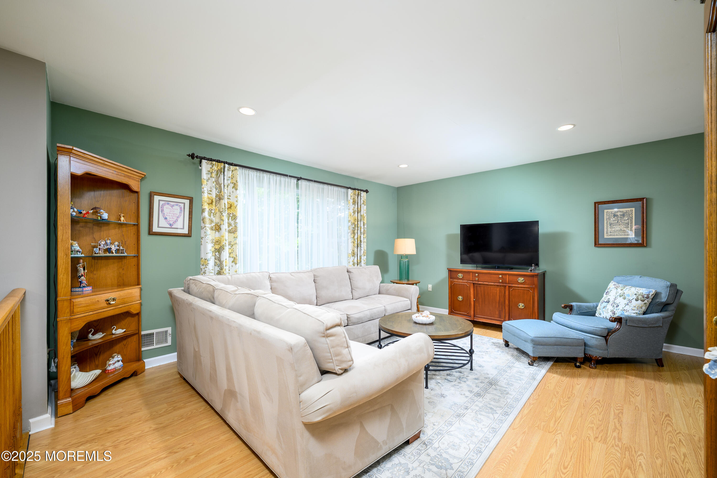 18 Fella Street Howell, NJ 07731 - Photo 4 of 35 a living room with furniture and a flat screen tv