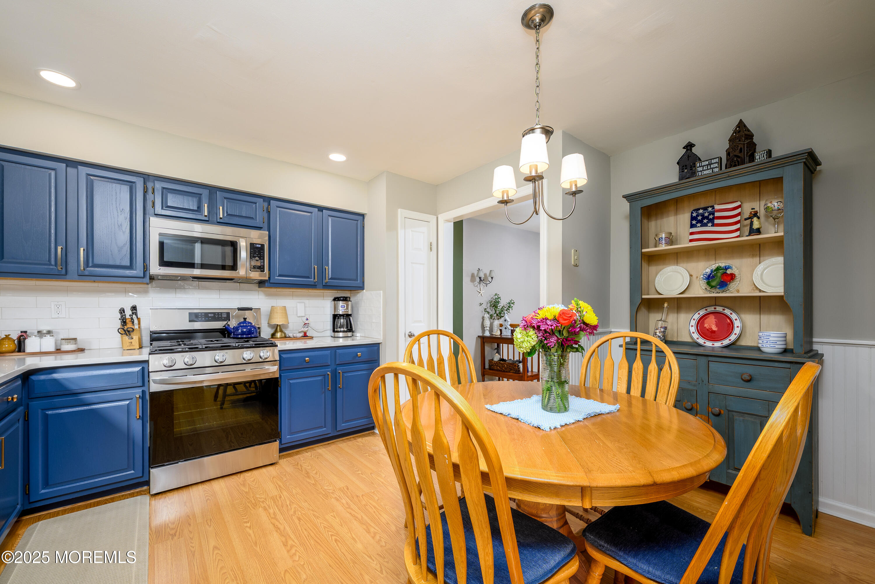 18 Fella Street Howell, NJ 07731 - Photo 8 of 35 a kitchen with a dining table and chairs