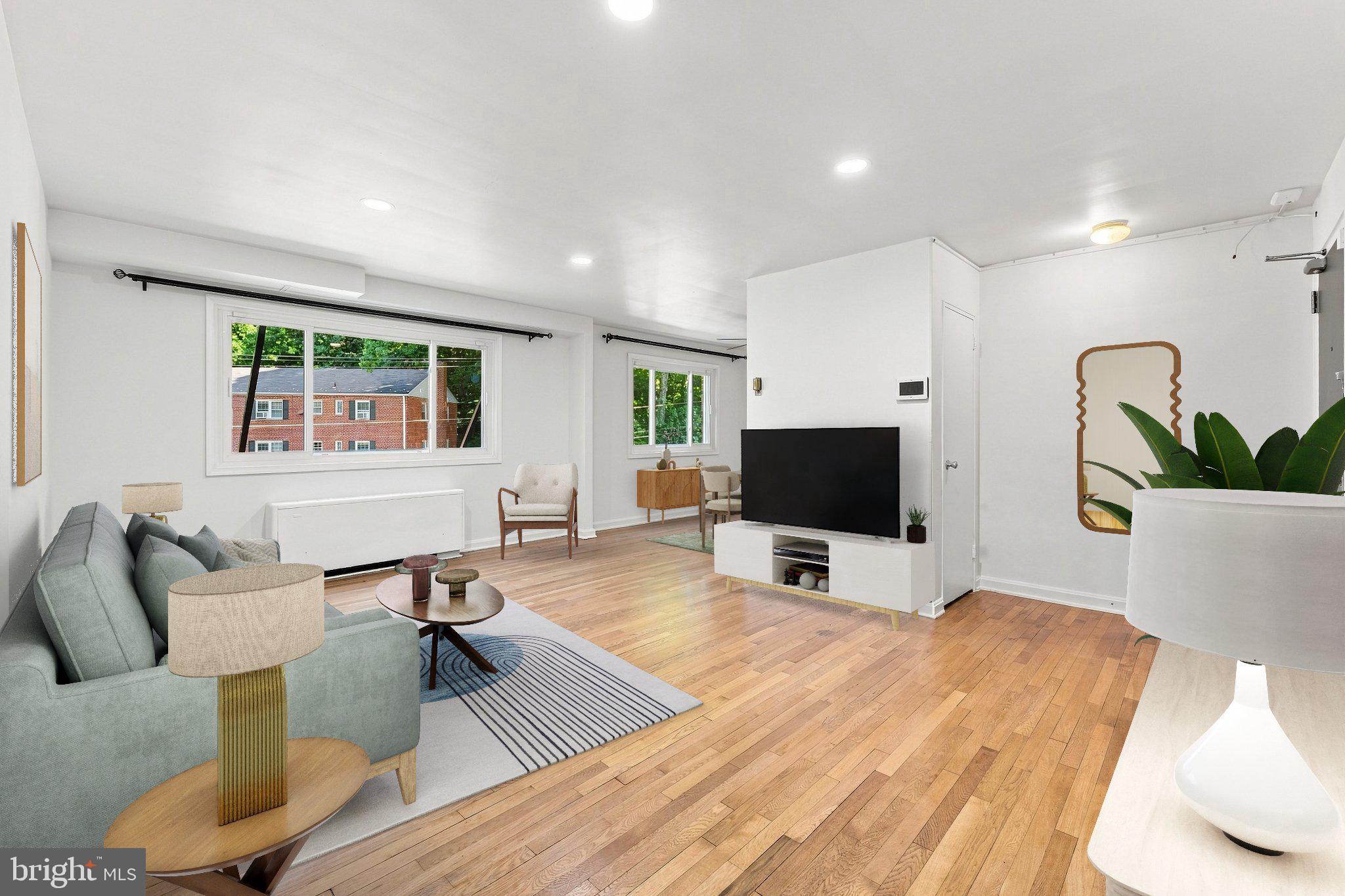 95 East Wayne Avenue, Unit 212 Silver Spring, MD 20901 - Photo 3 of 30 Living room (virtually staged)
