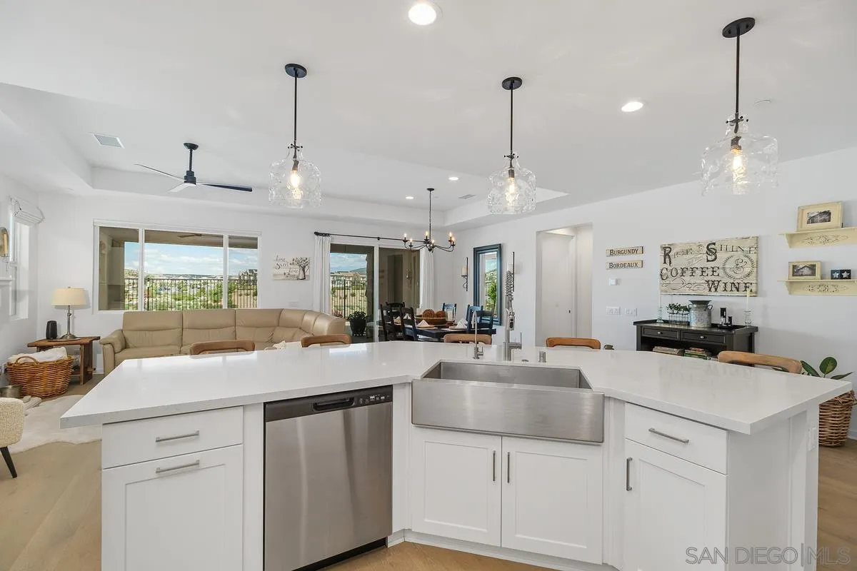 32082 Sedge Way Temecula, CA 92591 - Photo 14 of 59 a kitchen with counter top space appliances and cabinets
