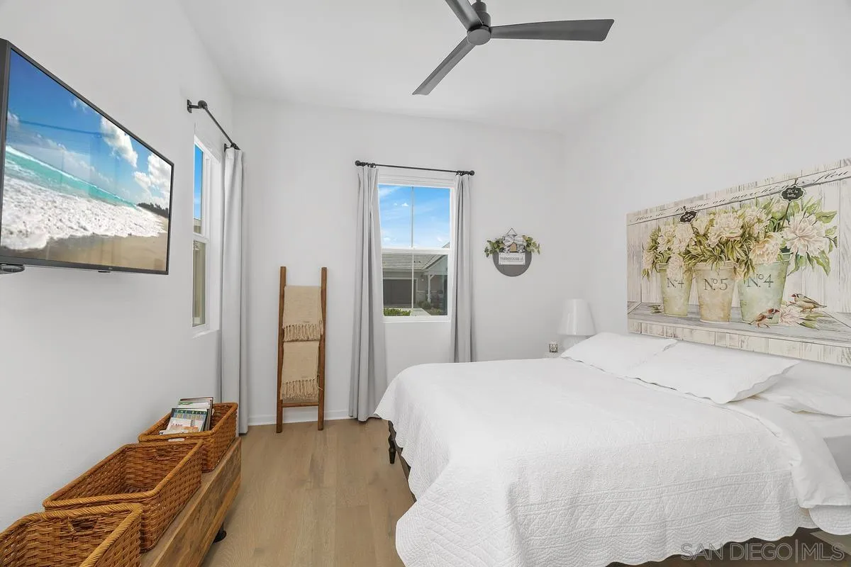 32082 Sedge Way Temecula, CA 92591 - Photo 19 of 59 a bedroom with a bed and a window