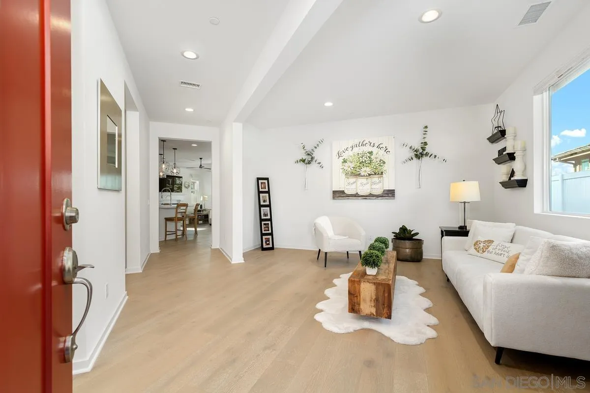 32082 Sedge Way Temecula, CA 92591 - Photo 2 of 59 a living room with furniture and a table