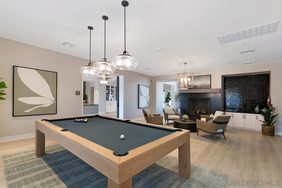 32082 Sedge Way Temecula, CA 92591 - Photo 40 of 59 a living room with furniture a table and a chandelier