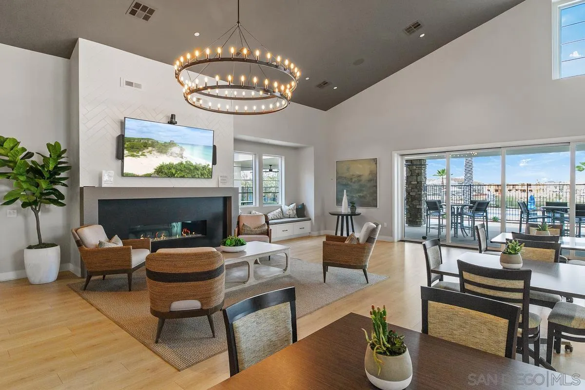 32082 Sedge Way Temecula, CA 92591 - Photo 41 of 59 a living room with furniture a fireplace and a large window