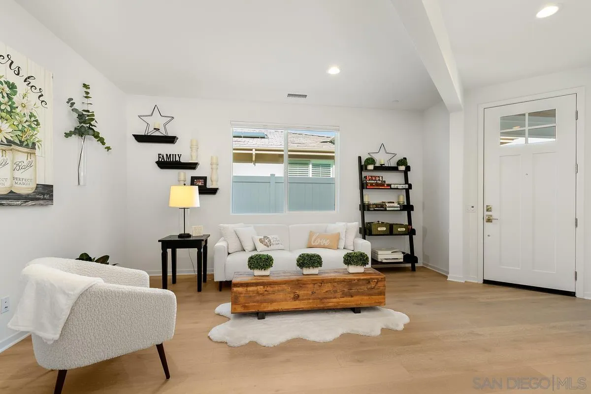 32082 Sedge Way Temecula, CA 92591 - Photo 5 of 59 a living room with furniture and a window