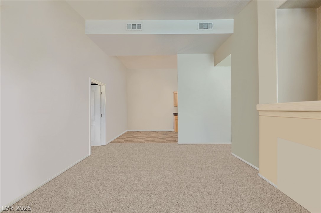 2305 West Horizon Ridge Parkway, Unit 1223 Henderson, NV 89052 - Photo 5 of 28 Spare room featuring light carpet
