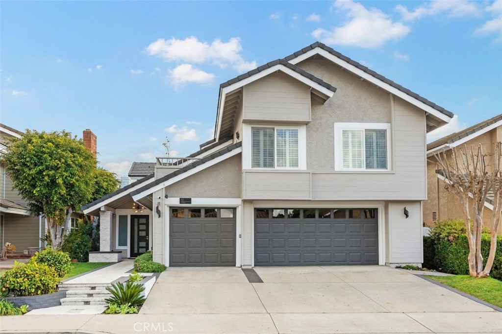 a front view of a house with yard