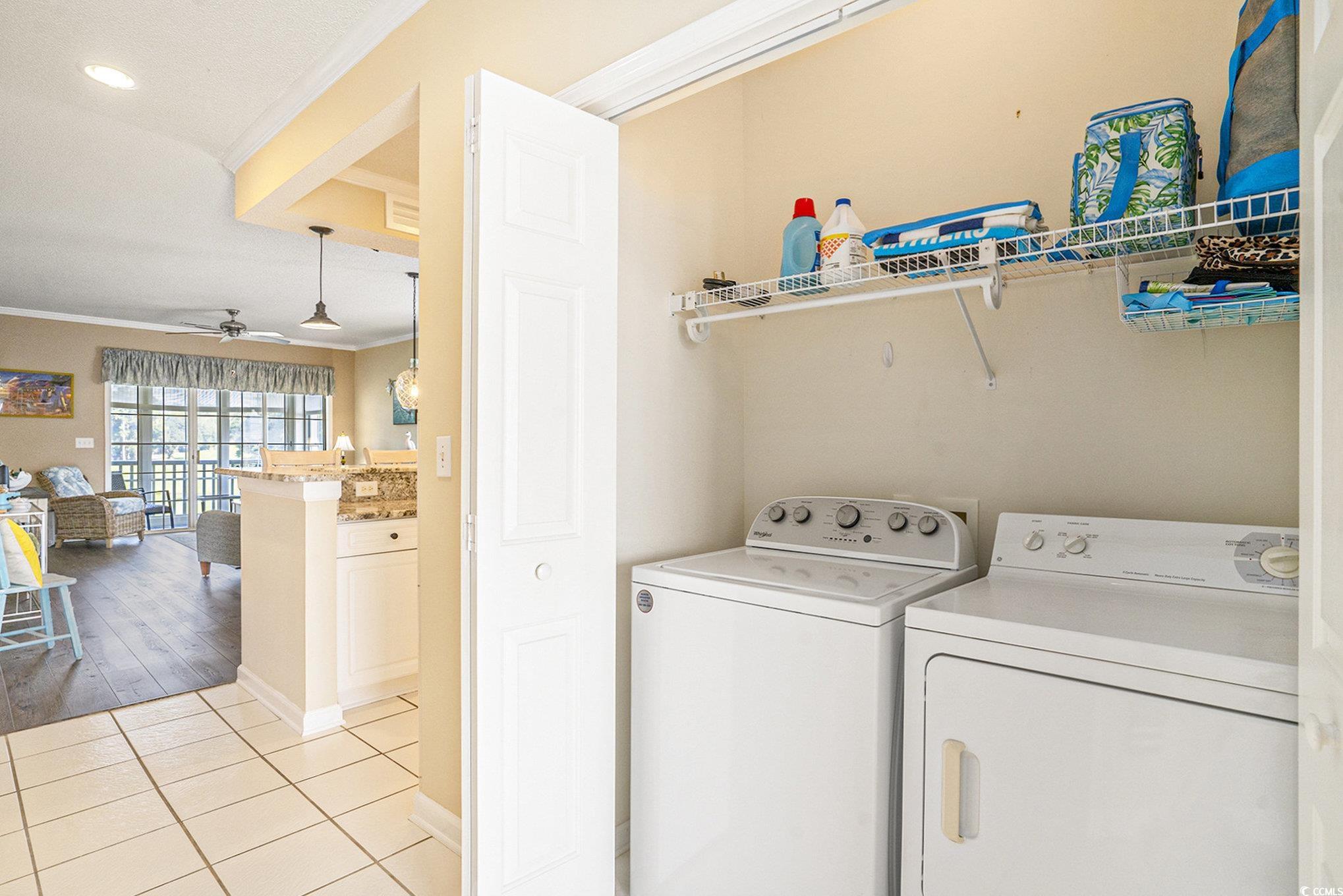 4459 Turtle Lane, Unit 3D Little River, SC 29566 - Photo 13 of 30 Laundry room with crown molding, light tile patterned floors, recessed lighting, a ceiling fan, and washing machine and clothes dryer