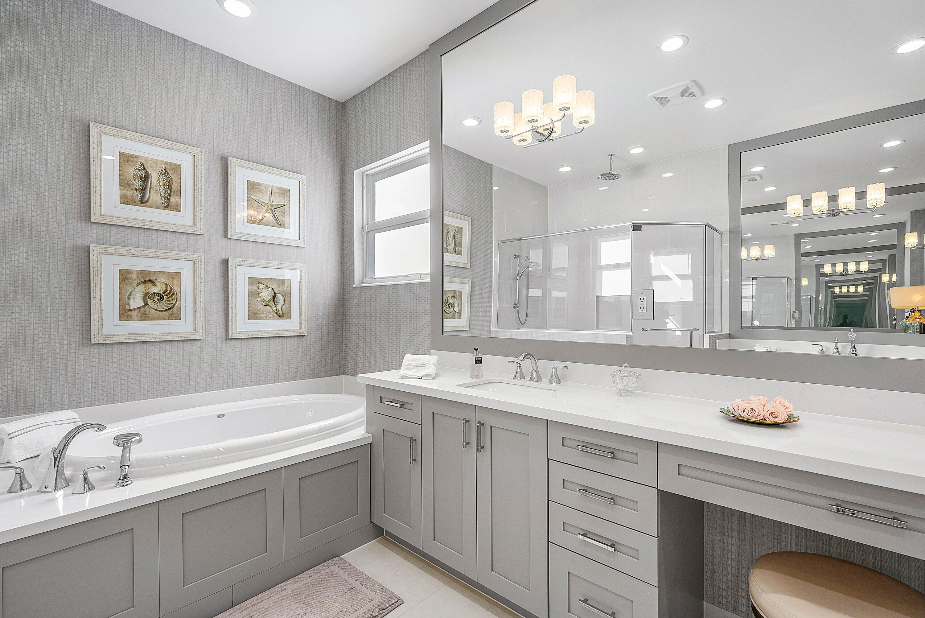 12626 Parrot Pond Road Boynton Beach, FL 33473 - Photo 32 of 67 a spacious bathroom with a sink double vanity granite and a large mirror