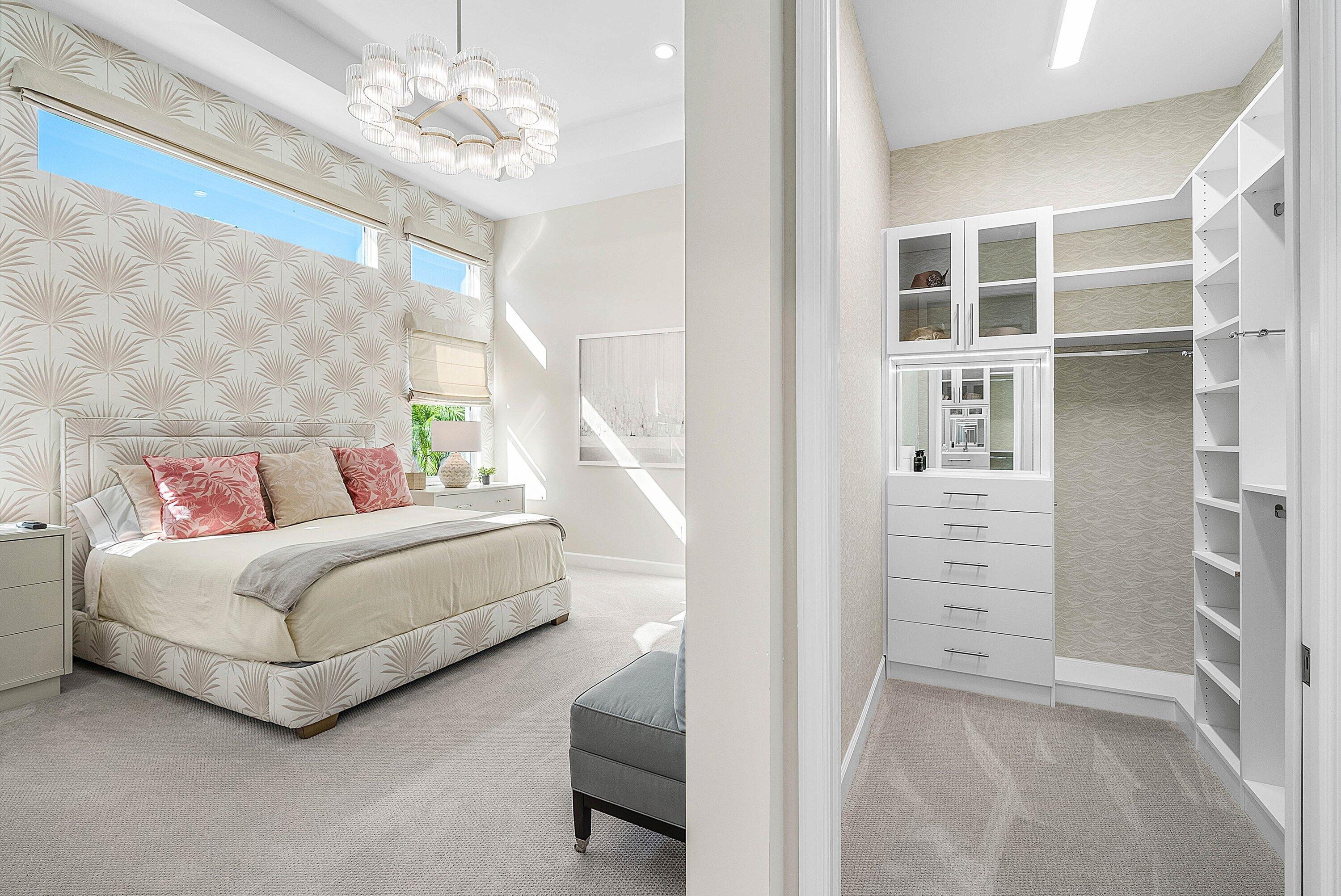 12626 Parrot Pond Road Boynton Beach, FL 33473 - Photo 36 of 67 a bedroom with furniture and a chandelier