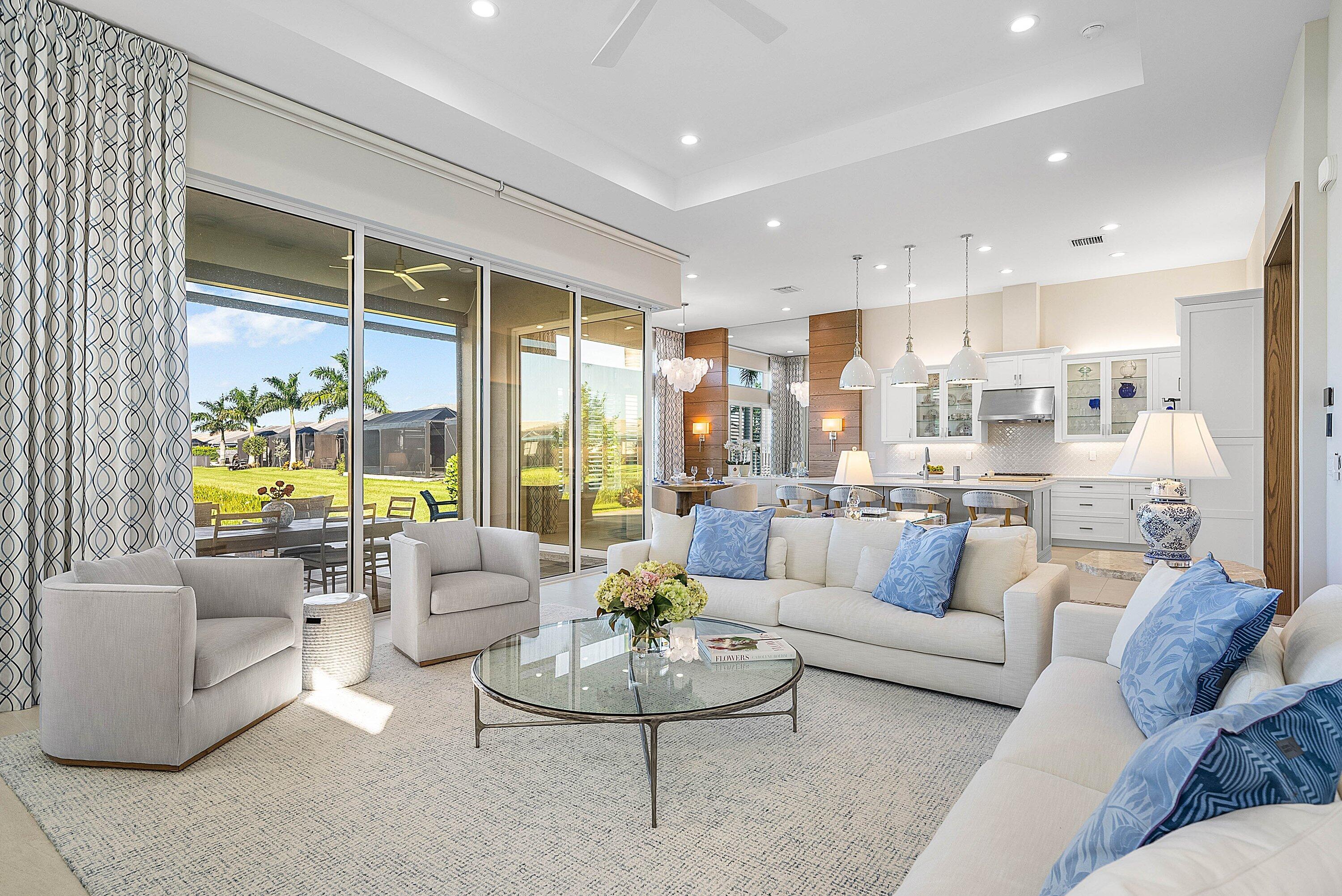 12626 Parrot Pond Road Boynton Beach, FL 33473 - Photo 10 of 67 a living room with furniture and a large window
