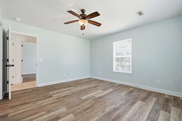 a bathroom with a sink toilet and vanity