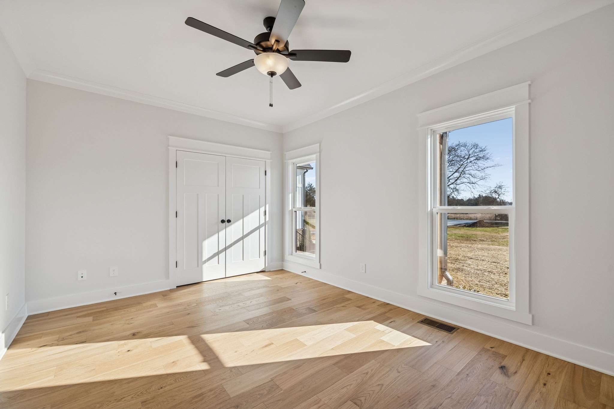 8533 Twelve Corners Road Lascassas, TN 37085 - Photo 24 of 79 wooden floor in an empty room with a window